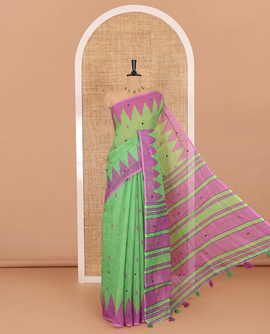 Green thilakam buttas and mirror work khadi mul cotton saree, contrast temple border, striped and buttas pallu, and a contrast printed blouse