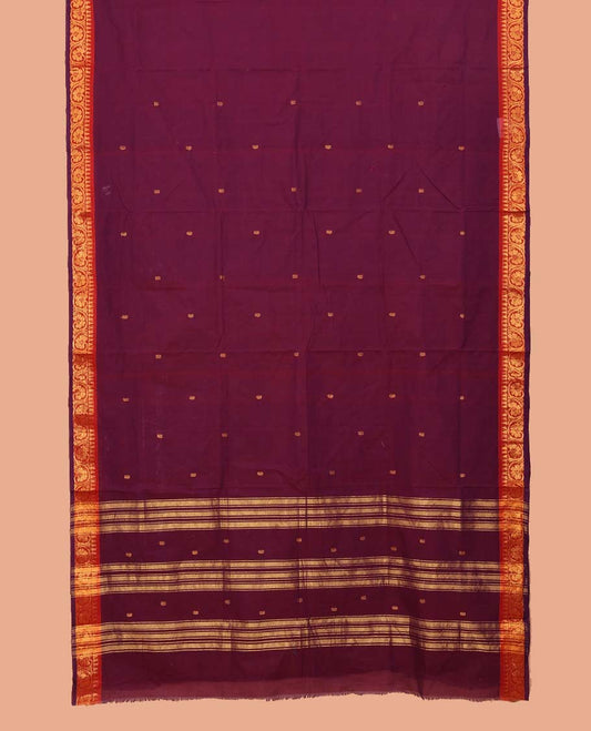 Purple Nine-Yard Cotton Saree Subtly Sparkled with Buttas All Over Its Body, Complemented by Contrast Temple Border of Floral Creeper Designs, a Gleaming Zari-Striped Pallu, and Comes Without a Blouse