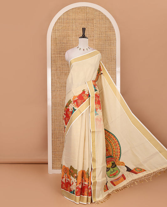 Cream kathakali motifs printed kerala saree, gold zari bavanji border, big kathakali motifs printed pallu & contrast Ajrakh printed blouse