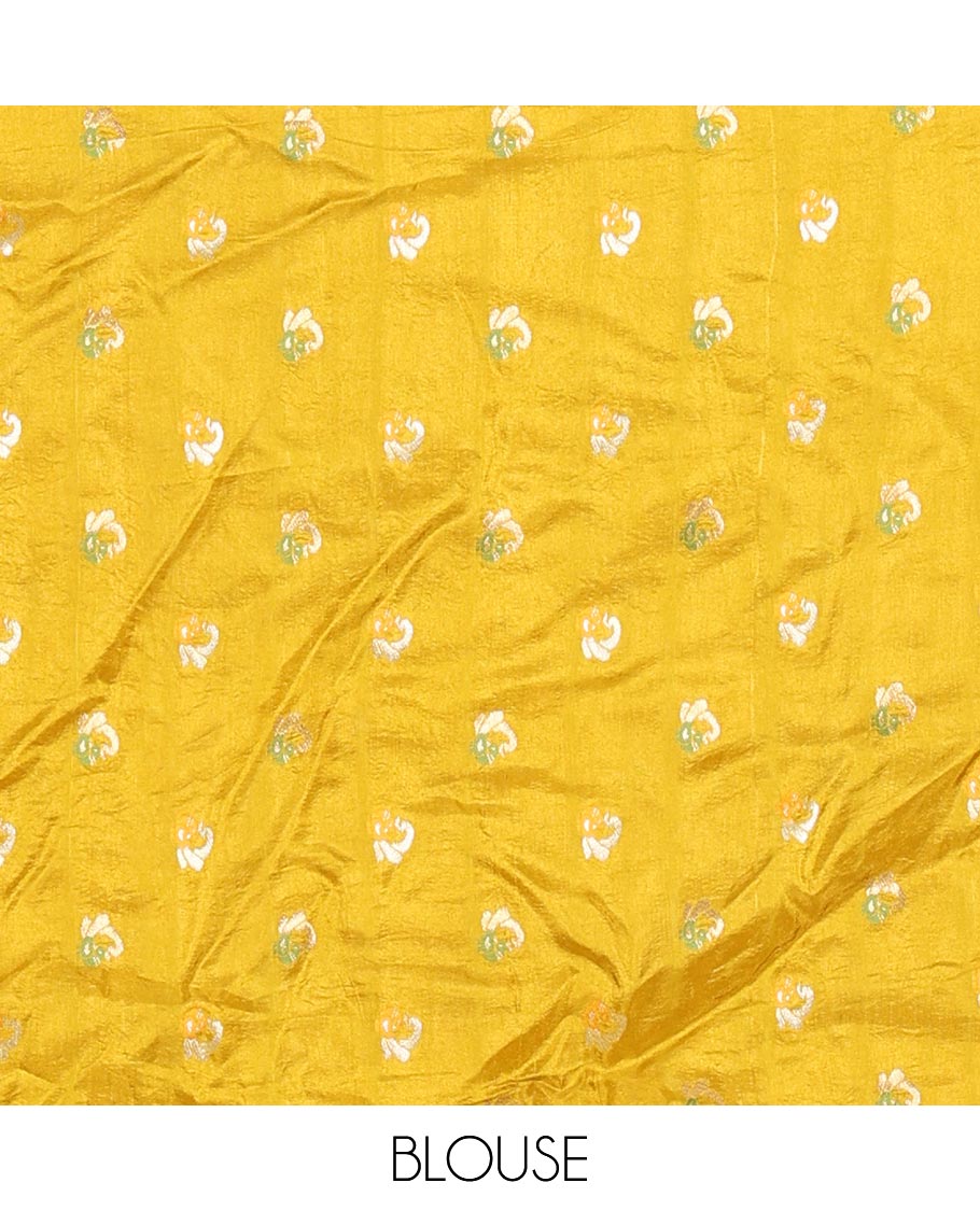 Yellow Russian Silk Saree Featuring Double-Sided Plain and Central Zari Elephant Motifs Weave, Accentuated by a Subtle Traditional Zari Border, Enhanced with a Zari-Designed Pallu, and Paired with a Blouse Depicting Meenakari Peacocks