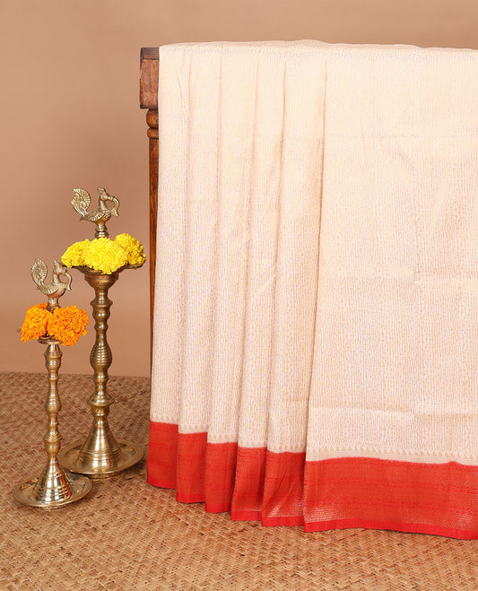 Cream with red zari weaving banaras softy saree with jacquard border & rich weaving pallu along with brocade blouse
