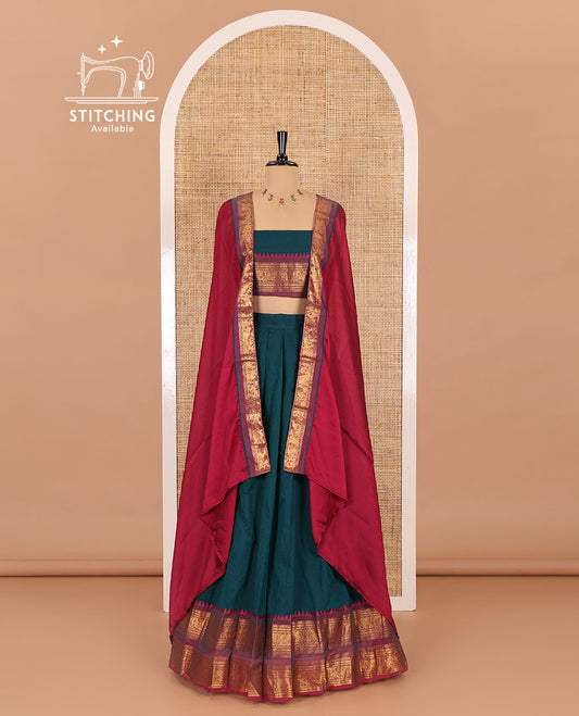 Peacock-rani pink sungudi cotton half-saree, plain with contrast traditional zari varisai pettu bordered skirt, a matching blouse, and a zari bordered dhavani