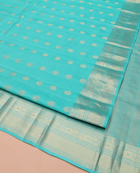 Blue Vasundhara Lite Silk Mix Saree, Sparsely Woven with Zari Buttas, Highlighted by a Zari Border of Rekku, Kamalam, and Mayil Kann Designs, Pallu of Jaal Designs, and Paired with a Matching Blouse