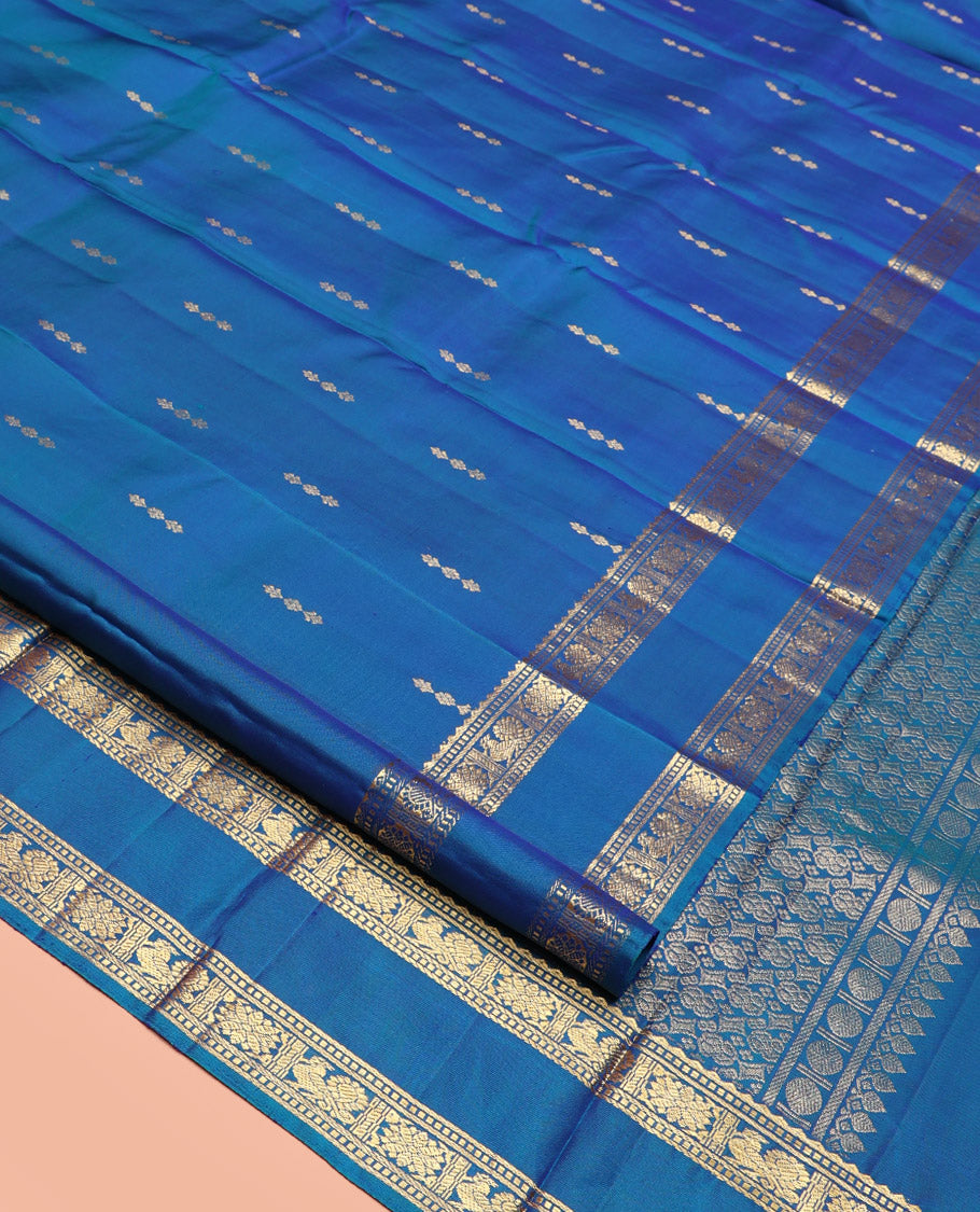 Blue Kanchipuram Silk Saree, Majestically Detailed with Zari Buttas, Highlighted by Zari Traditional Rettai Pettu Border, Grand Pallu, and Matching Blouse