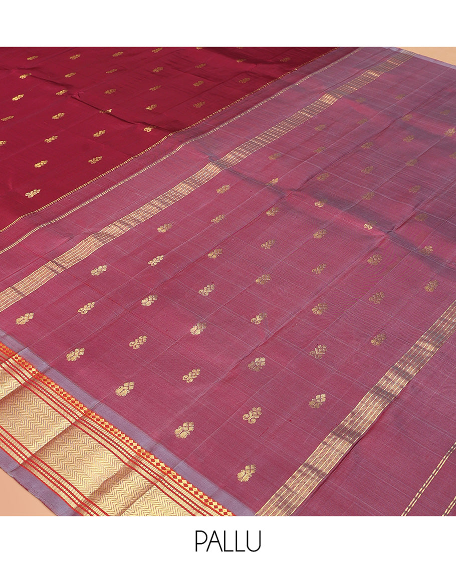 Maroon Kanchipuram Silk Saree, Ornamented with Zari Buttas, Complemented by a Contrast Border of Panner Sombu, Banaras, Muthu, and Vanki Design, Zari Design Pallu, and No Blouse
