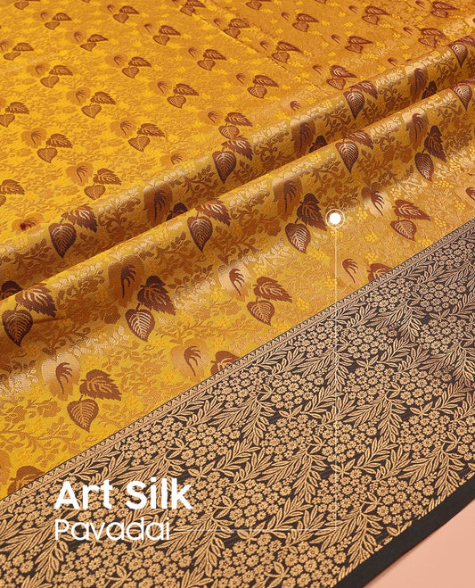 Mustard Art Silk Pavadai Material Set Mesmerized with Leaf Jacquard Design on Its Skirt, Complemented by a Contrast Floral Zari Design Border, and Paired with a Contrast Blouse