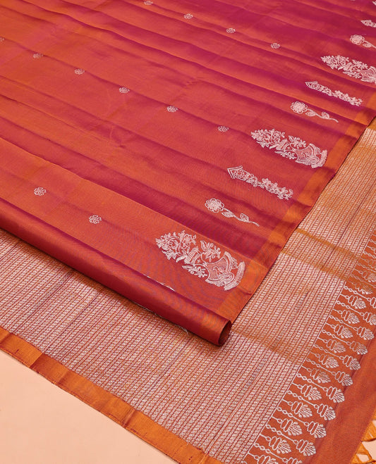 Borderless Orange Mayuri Soft Silk Saree, Entralled with Zari Buttas All Over Its Body, Highlighted by Traditional Zari Designs Woven Pallu, and Paired with a Matching Blouse