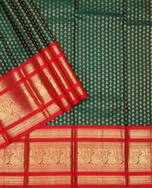 Green puresilk halfsaree, zari buttas skirt, contrast rettai pettu border, blouse of thilakam mokku, kathir, muthu, and mayil design, and zari woven pallu