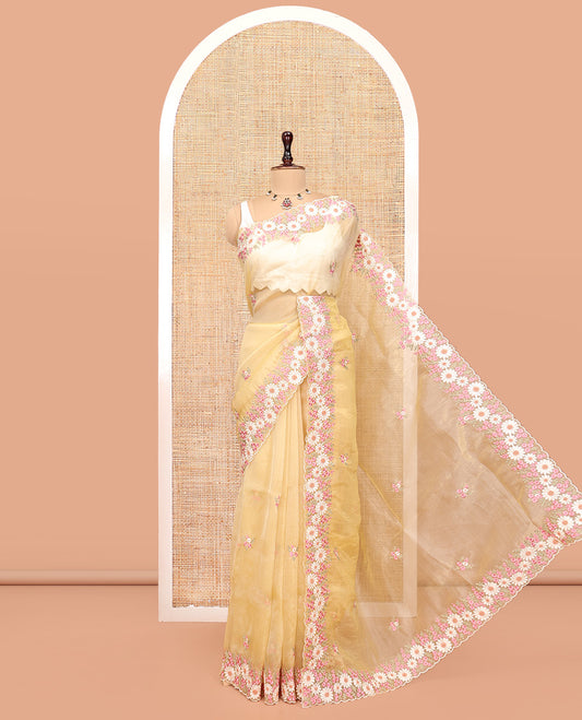Yellow Organza Saree, Boldly Accentuated with Flower-Color Thread Embroidery, a Scallop Border, and a Matching Blouse