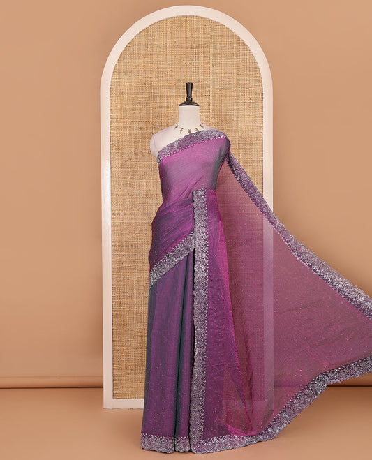 Purple Swarovski crystal stone embedded fendy chiffon saree, scallop border accentuated with floral and scallop design in Swarovski stones