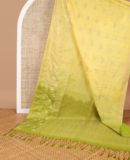 Light yellow tree buttas soft silk saree with self floral design & intricate zari design pallu