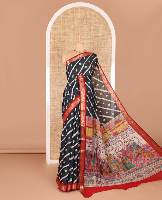 Black batik style lehariya stripes printed muslin silk saree, contrast peacock zari woven border, Mughal inspired painting style motifs printed pallu and a contrast blouse