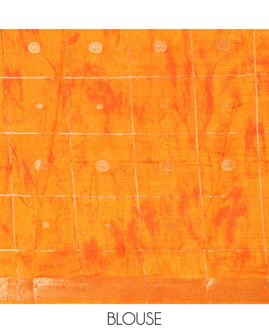 Blue buttas enclosed checked dola silk saree, contrast shibori print with traditional zari border, buttas enclosed checked pallu, and a contrast buttas enclosed checked blouse