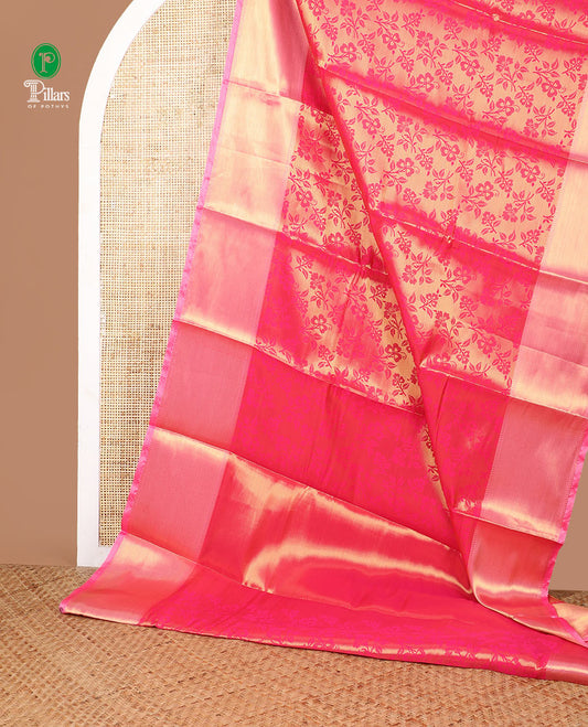 Rani pink floral design tissue saree with zari border & rich pallu along with contrast blouse