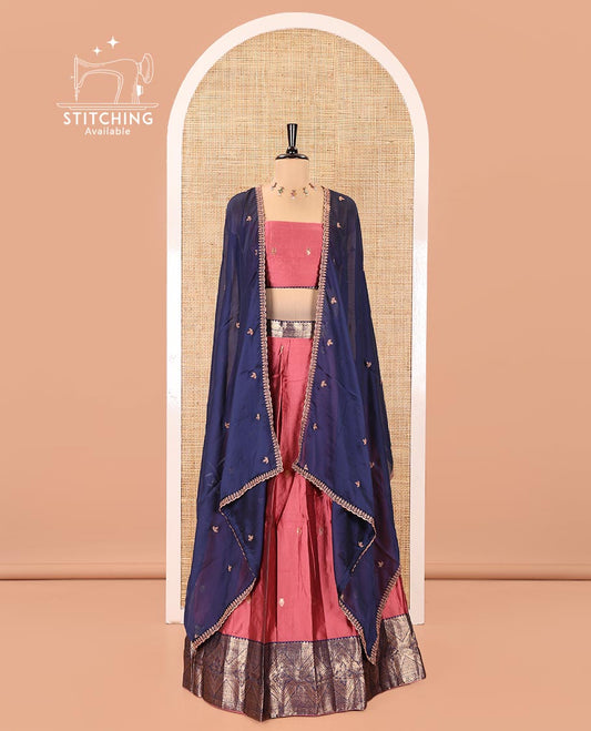 Onion Pink and Blue Semi-Banarasi Half-Saree, Elevated with Zari Buttas on Its Skirt, Complemented by a Contrast Traditional Zari-Design Border, Paired with a Matching Blouse, and a Contrast Satin Georgette Zari-Bordered Dhavani