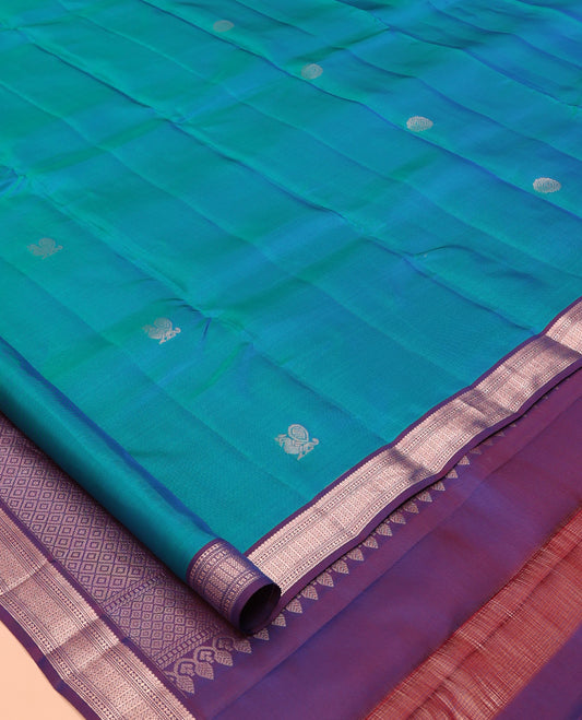 Peacock Blue Vasundhara Lite Silk Mix Saree, Elevated with Mayil Buttas, a Contrast Traditional Zari Border, Grand Jaal Pallu, and a Contrast Blouse