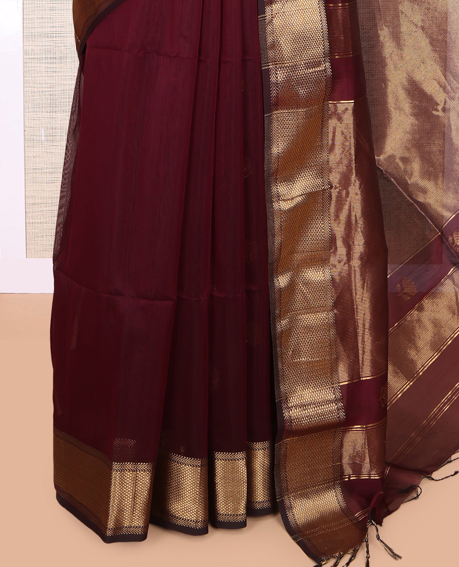 Maroon Maheshwari Cotton Saree, Elevated with Buttas, Highlighted by a Traditional Zari Border, Zari Gleamed Up Pallu, and a Matching Blouse