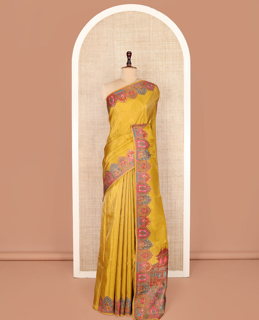 Yellow Plain Dola Silk Saree, Complemented by Captivating Contrast Border of Meenakari-style Mughal Human Figurines, Pallu Artfully Pictures Mughal Human Figurines, and Paired with a Matching Blouse