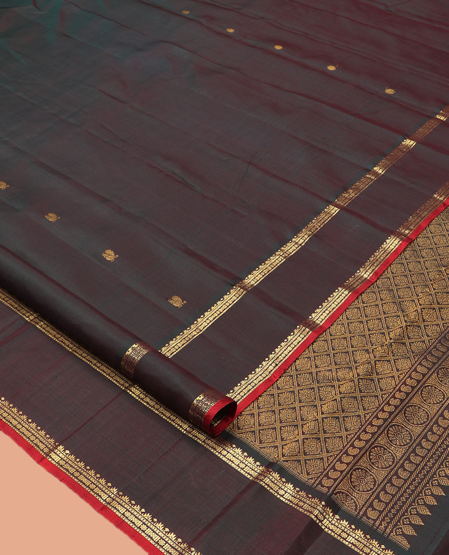 Brown Kanchipuram Silk Saree, Embellished with Mayil-Chakram Buttas, Highlighted by a Rettai Pettu Border, Grand Jaal Pallu, and Matching Blouse