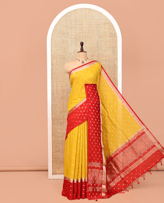 Yellow Assam Silk Saree, Steeped with Zari Buttas, Complemented by Contrast Zari Buttas Woven Border, Gleaming Pallu, and Contrast Blouse