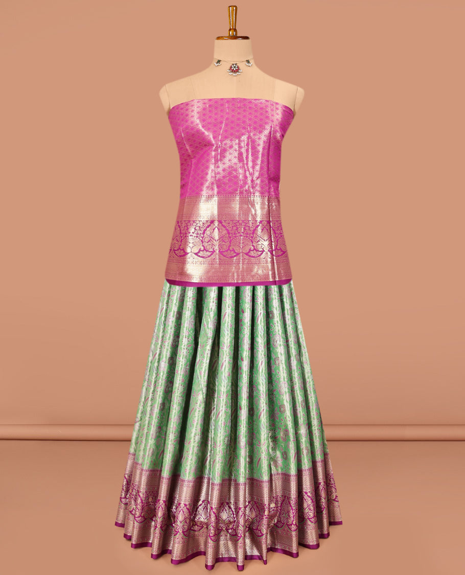 Green Art Silk Material Half Saree Set, Accentuated with Jacquard Design Skirt, a Contrast Meenakari Border, Contrast Blouse, and an Intricately Designed Dhavani