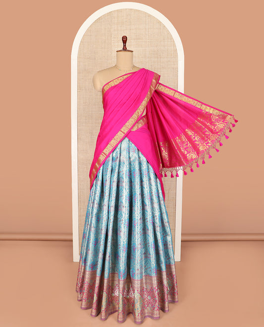 Blue Art Silk Material Half Saree Set Featuring Meenakari Mughal-Style Jacquard Skirt, a Contrast Traditional Zari-Designed Steeped Border, a Zari Jacquard Blouse, and a Dhavani Adorned with Zari Designs