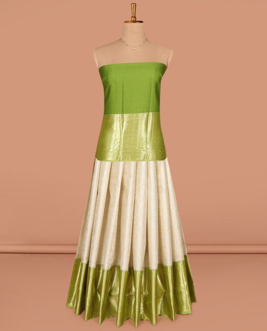 Cream Art Silk Pavadai Material Set, Subtly Sparkled with Jacquard Designs on Its Skirt, Complemented by a Contrast Traditional Zari Design Big Border, and Paired with a Contrast Blouse