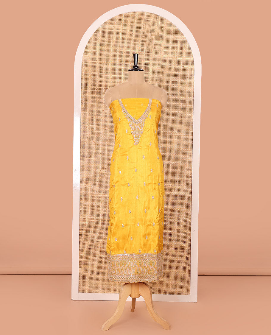 Yellow Material Chudidar Set Beautified with Intricately Embroidered Muga Silk Top, Subtly Made Plain Santoon Bottom, and a Bemberg Chiffon Dupatta Featuring Floral Printed, and Embroidery