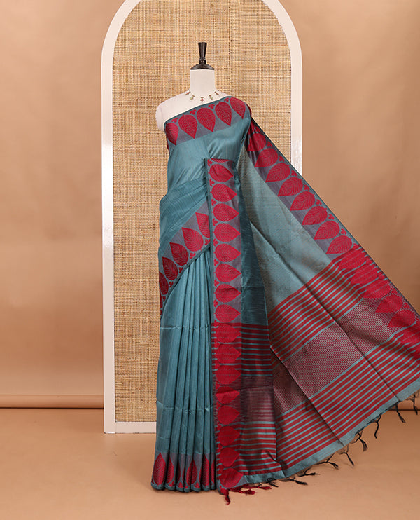 Green plain jute cotton saree , contrast leaf thread butta border & lining seer pallu with tussels