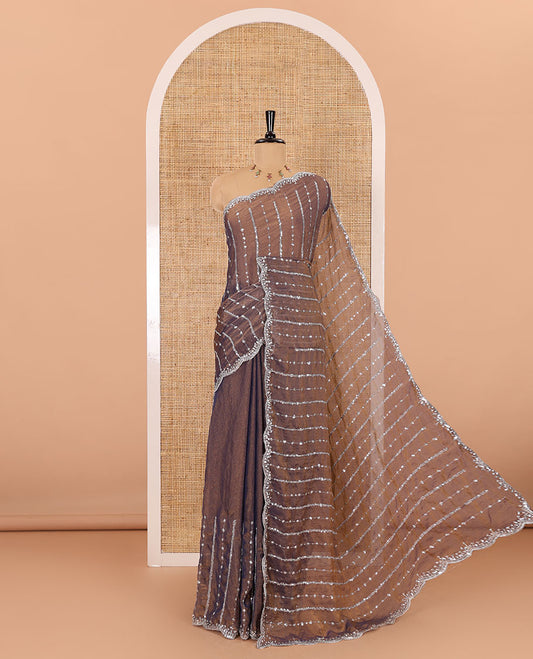 Navy blue vertical stripes embroidered shimmer chiffon saree, scallop embroidered border, embroidered pallu, and fancy embroidered matching blouse