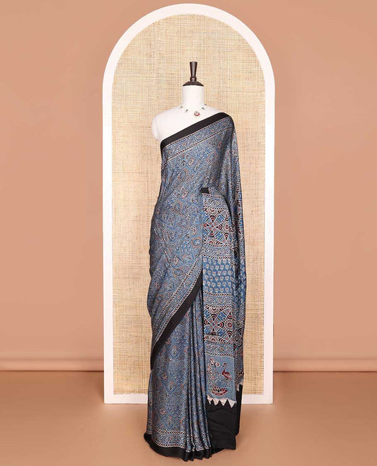 Blue floral design modal silk saree with contrast border & floral design pallu
