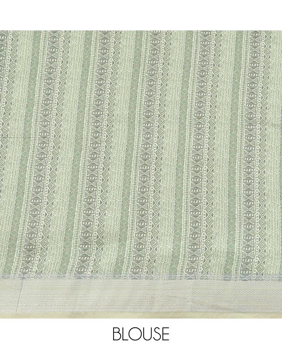 Green floral printed chanderi cotton saree with contrsat zari border & intricate design pallu