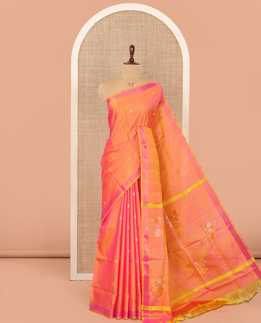 Orange Uppada Silk Saree Decorated with Zari Buttas, Complemented by Bavanji Border, Pallu Depicting Floral Motifs, and Paired with a Matching Blouse