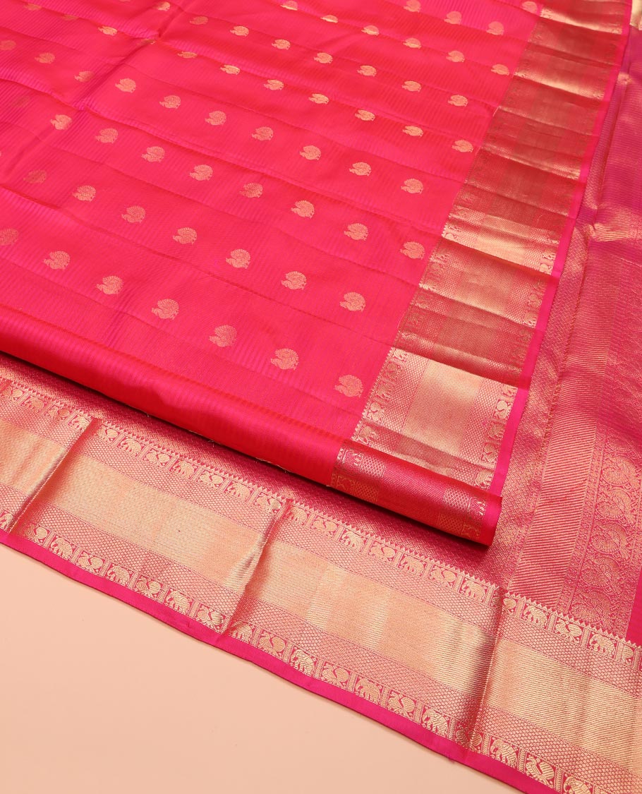 Pink Kanchipuram Silk Saree, Adorned with Mayil Buttas on Its Body, Highlighted by a Zari Border of Rekku, Mayil, Yaanai, and Mayil Kann Designs, Grand Pallu of Chevron Designs, and Paired with a Matching Blouse