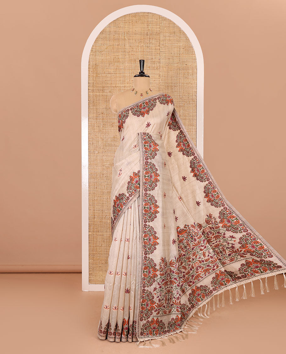 Cream lotus motifs thread woven jute cotton, scallop thread woven border, pallu of lotus, peacock and paisley designs along with a plain blouse