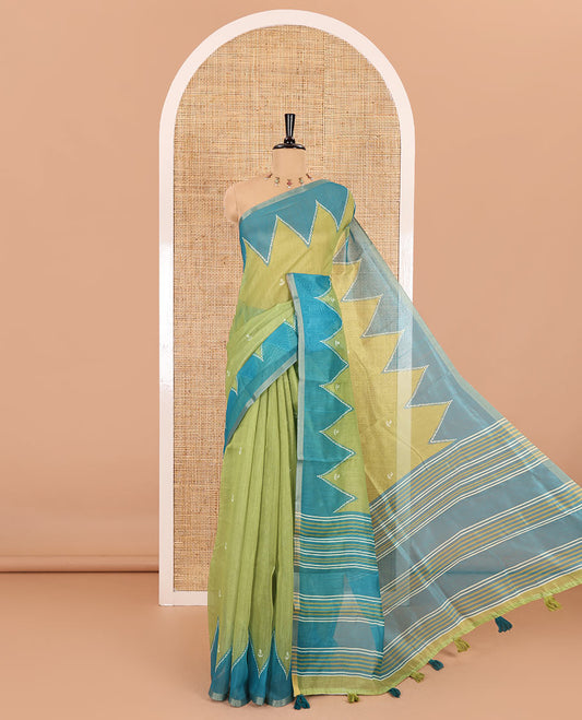 Parrot green small buttas printed Linen cotton saree, contrast double-sided temple border, striped pallu, and vertically striped blouse