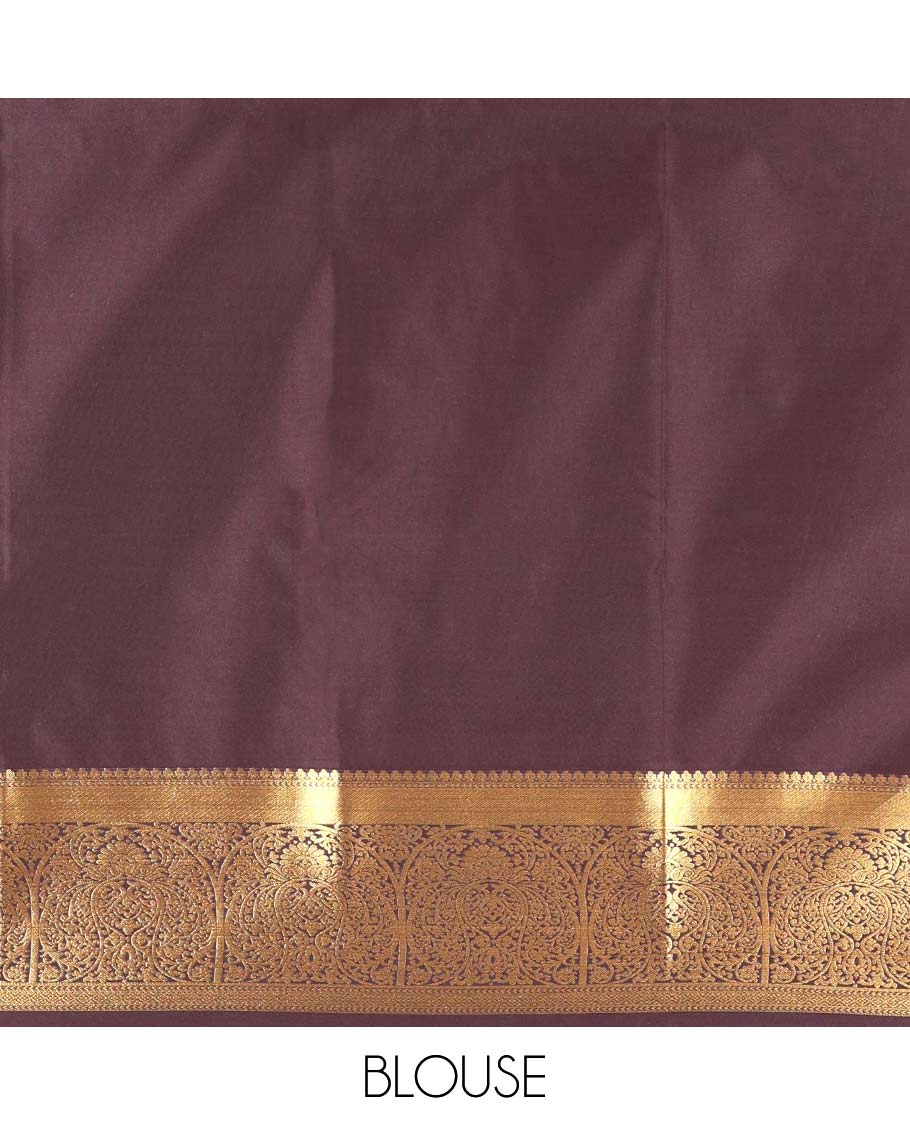 Brown Kanchipuram budget silk saree artfully woven with chakram zari butta enclosed checks all over its body, complemented by zari traditional design border, Mughal-style intricately woven pallu, and paired with a Matching blouse