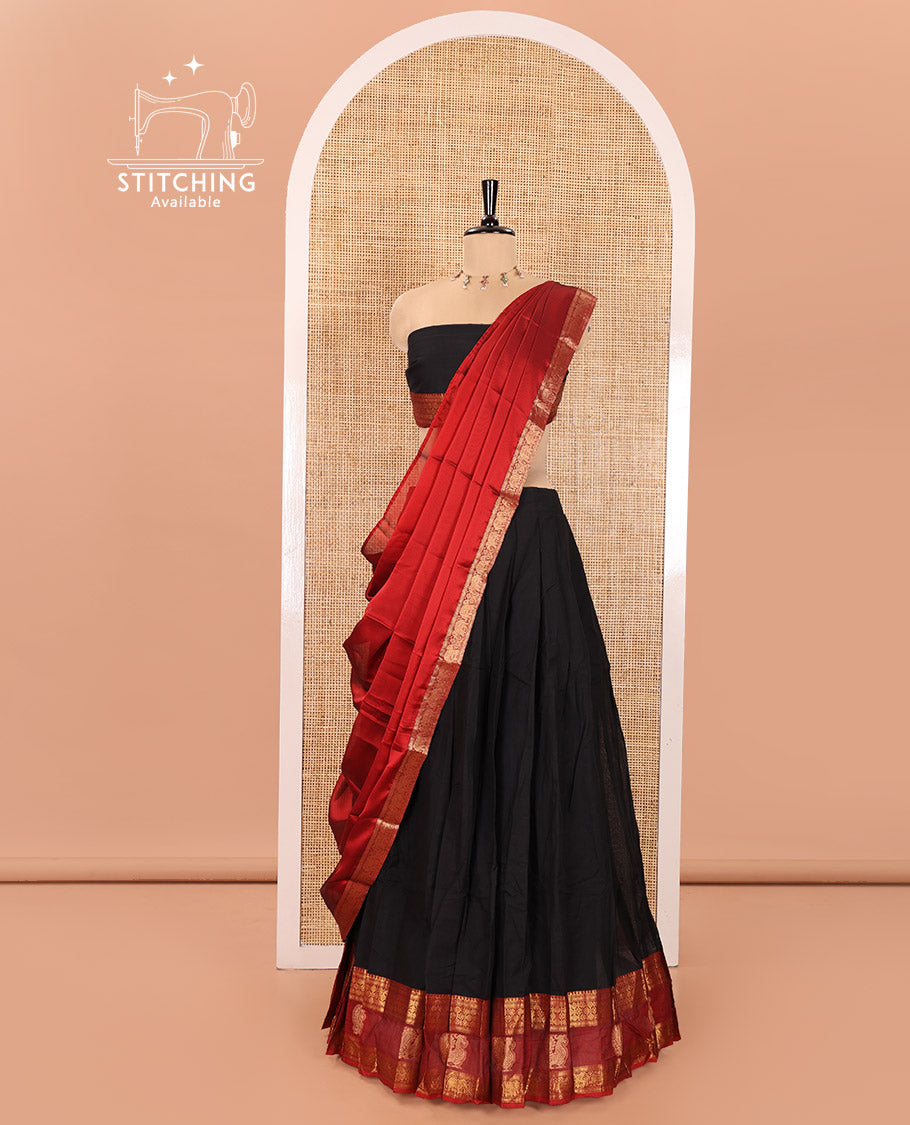 Black Chettinad Cotton Half-Saree Featuring Plain Skirt, Complemented by Contrast Traditional Border of Peacock and Rudraksha Designs, Paired with a Matching Blouse, and a Satin Georgette Zari Bordered Dhavani