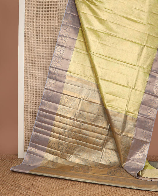 Yellow Mughal style zari jacquard budget silk saree, contrast traditional zari border, and pallu of Mughal inspired intricate motifs