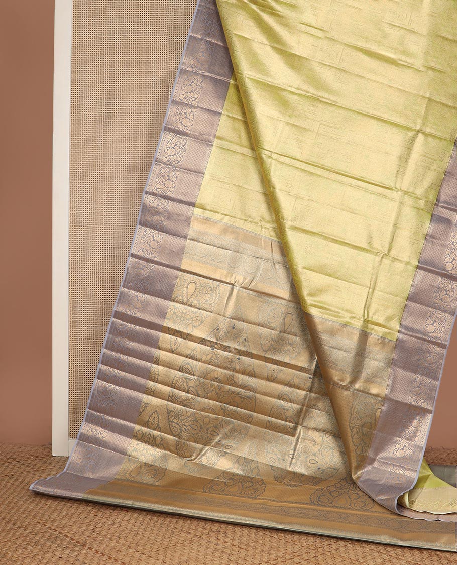 Yellow Mughal style zari jacquard budget silk saree, contrast traditional zari border, and pallu of Mughal inspired intricate motifs