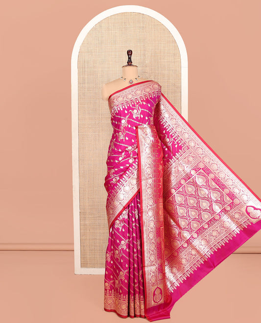 Rani Pink Banarasi Nylon Saree, Opulently Embellished with Zari Designs, Highlighted by a Traditional Zari Border, Intricate Pallu, and a Matching Blouse