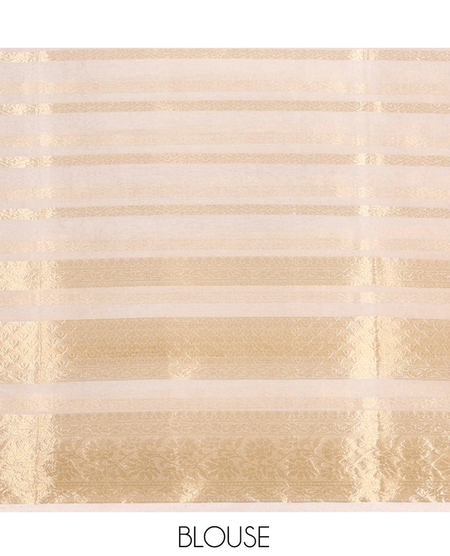 Cream Semi-Organza Saree, Gleamed Up with Zari Stripes All Over Its Body, Highlighted by a Traditional Zari Design Border, Gleaming Zari Striped Pallu, and Paired with a Matching Blouse