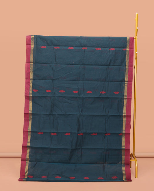 Teal Blue Kanchi Cotton Saree, Elevated with Thread Buttas On Its Body, Complemented by a Contrast Border, Floral-Design Pallu, and a Matching Blouse
