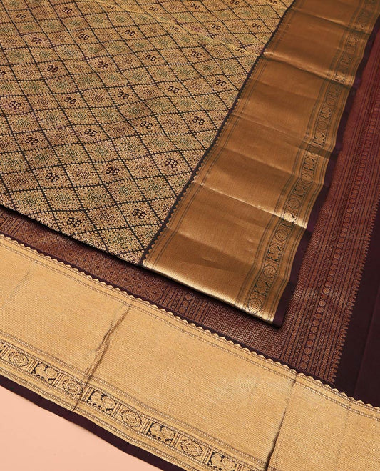 Brown Kanchipuram Wedding Silk Saree, Decked Up with Jacquard Design On Its Body, Highlighted by Zari Border of Rekku, Mayil and Chakram Designs, Grand Jaal Pallu and Paired with a Matching Blouse