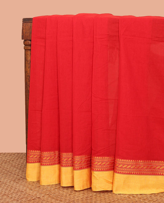 Red Plain Khadi Cotton Saree, Complemented by a Contrast Traditional Motifs Thread Woven Border, Pallu Depicting Stripes, and Comes Without a Blouse