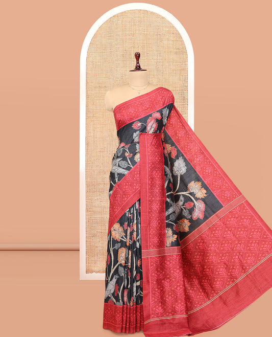 Black Fancy Tussar Saree Features Kalamkari Floral Vine and Bird Print, Contrast Patola Border, Patola Pallu, and a Contrast Blouse