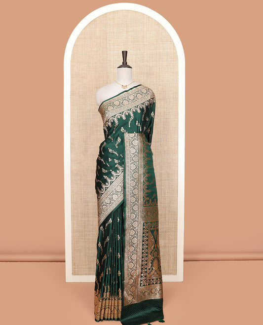 Green floral buttas banarasi silk saree, traditional zari border of floral creeper designs, and pallu of intricate designs