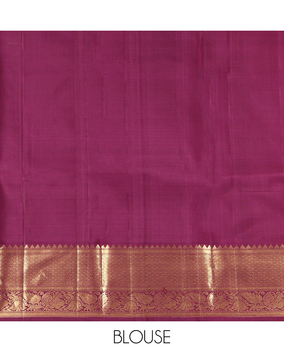 Maroon Kanchipuram Silk Saree, Accentuated with Kuthirai Buttas All Over Its Body, Highlighted by a Zari Border of Rekku, Muthu, Kathir, Mayil Kann, and Mayil Designs, Grand Jaal Pallu, and Paired with a Matching Blouse