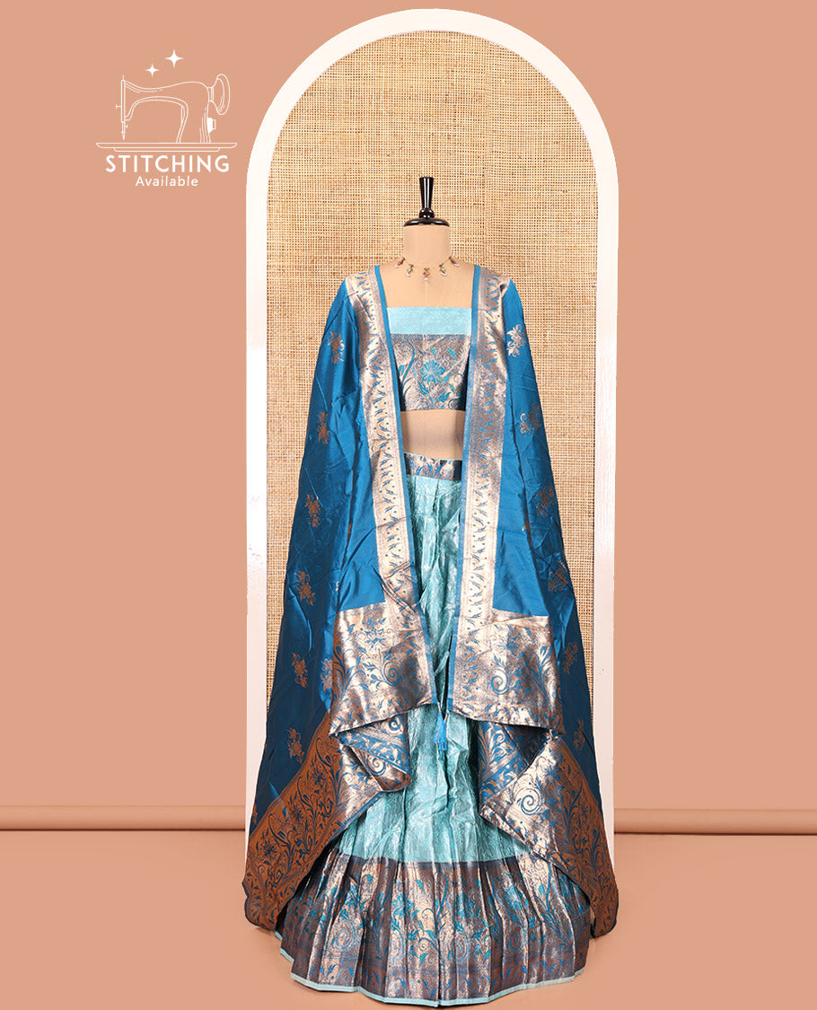 Sea Green and Peacock Green Half-Saree Set, Subtly Sparkled with Floral Vine Design on Its Banarasi Skirt, Complemented by Contrast Meenakari Floral Design with Embroidered Border, Matching Blouse, and Paired with a Banaras Dupatta