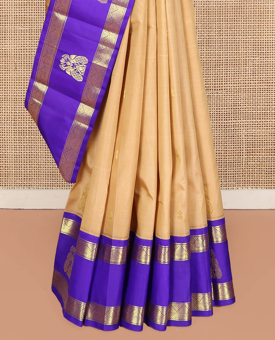 Sandal Kanchipuram Silk Saree, Highlighted with Zari Buttas on Its Body, Complemented by a Contrast One-Sided Korvai Border of Diamond and Mayil Designs, Pallu Features Floral and Paisley Designs, and Comes Without a Blouse
